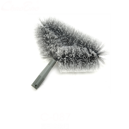 A gray duster with soft, fluffy bristles and an ergonomic handle designed for cleaning delicate surfaces. – Quickway Supplies